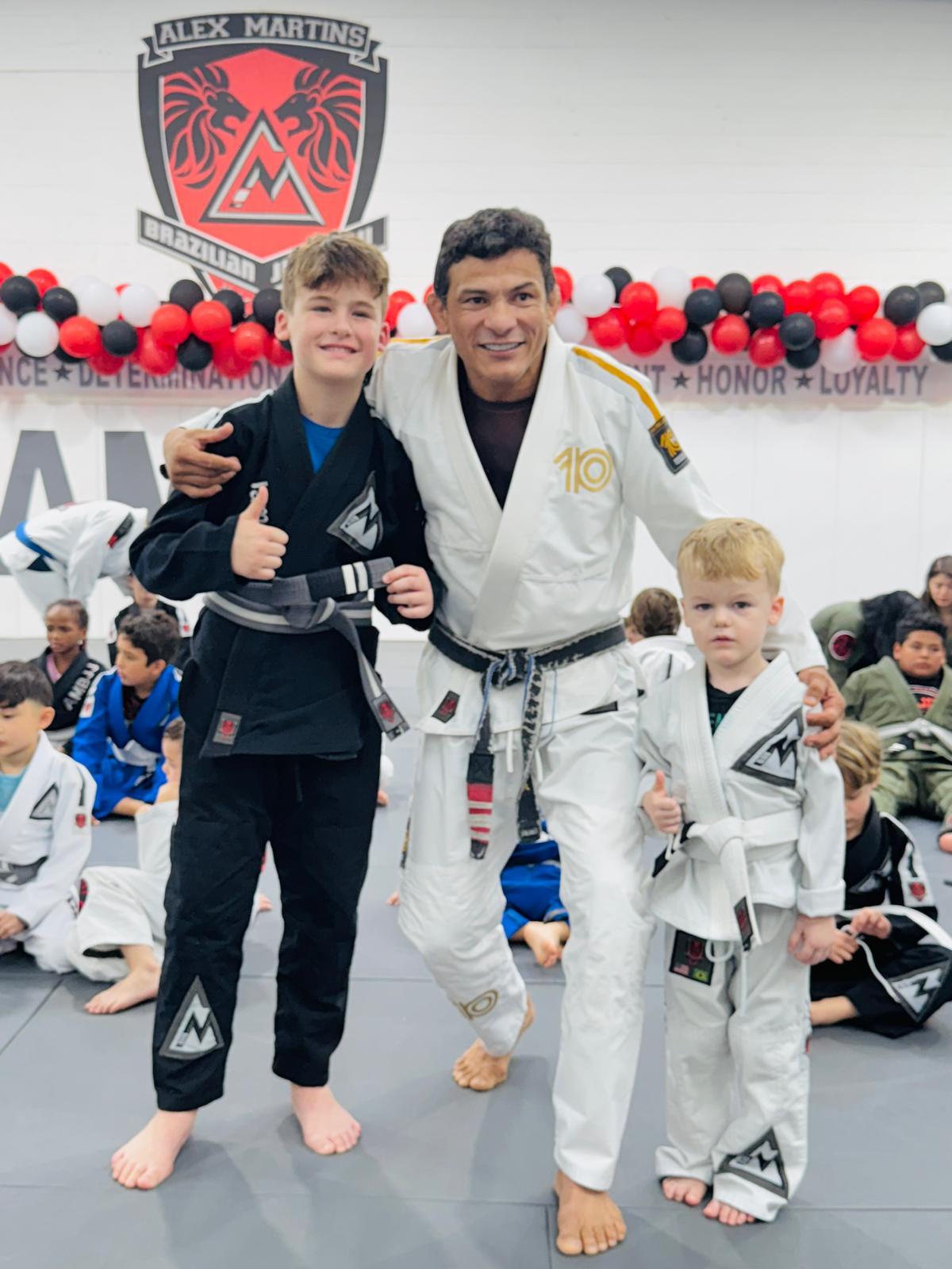 Professor Alex Martins Teaching Downtown Dallas kid in BJJ Classes